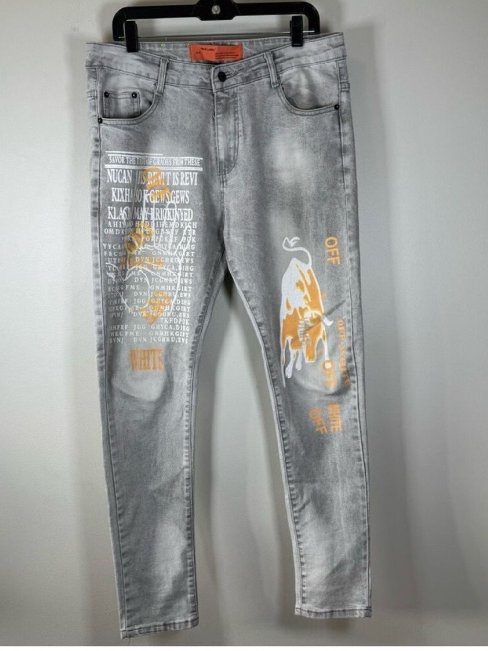 Off-White Light Gray Skinny Jeans with Orange Accents. 36